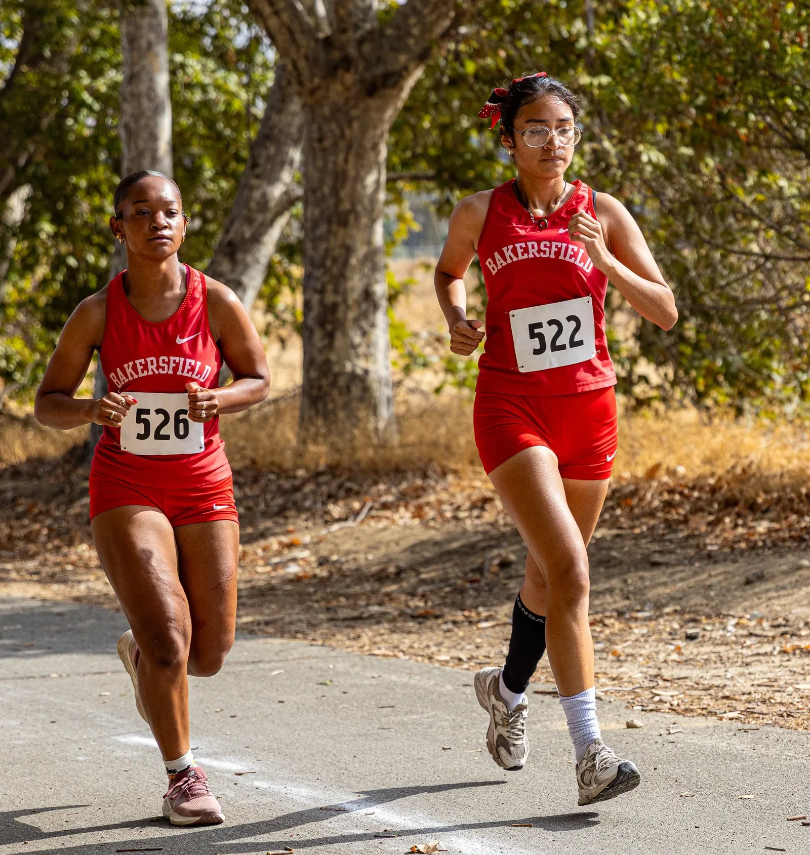 Action & Athletics — BC cross country runners side by side