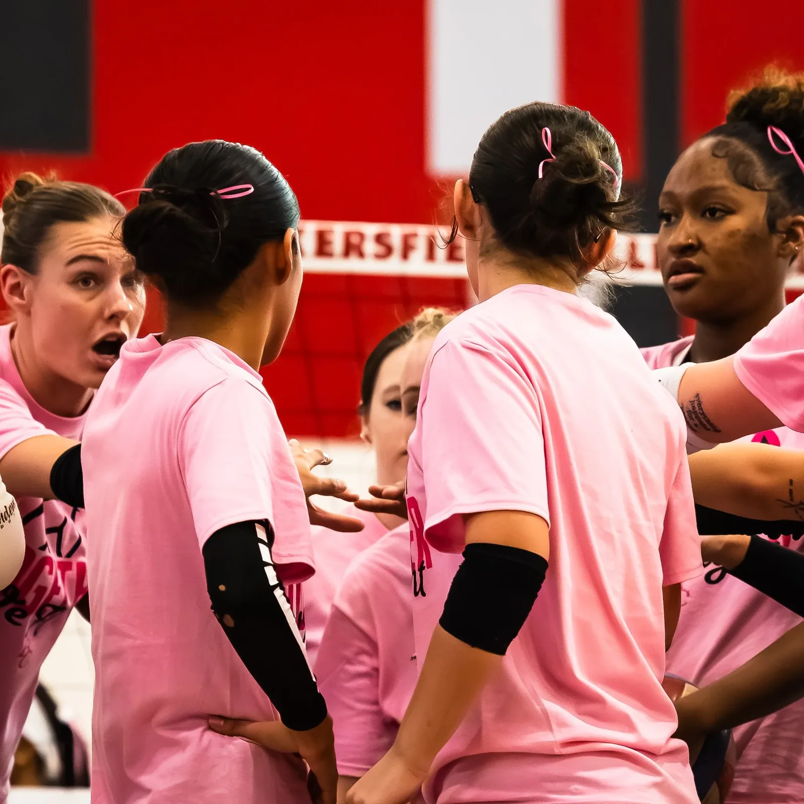 Action & Athletics — BC volleyball huddle